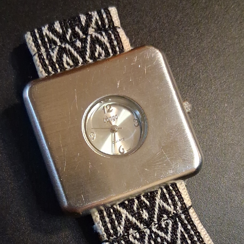 BONGO Stainless Steel Face & Bezel. Black & Cream Strap. New Battery & Strap.